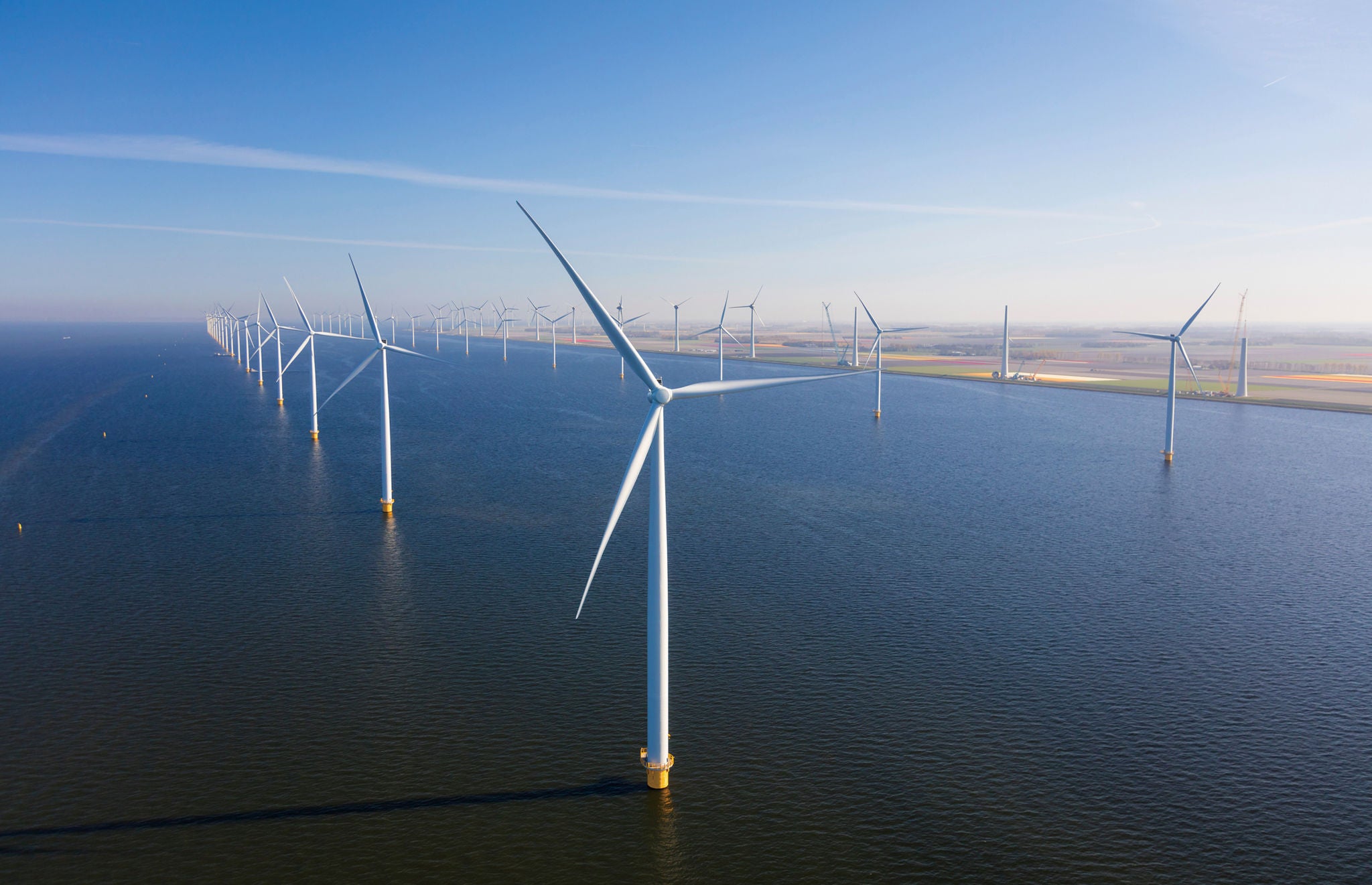 Aerial view of wind turbines at sea, North Holland, Netherlands